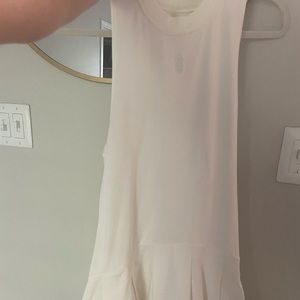 Free people athletic dress, never worn, small zipper pocket on the back